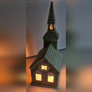 Unique Cream & Green Brick Church Lights Up Tall Steeple